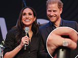 Meghan Markle sports mysterious $62,000 Lorraine Schwartz pinky ring made with 'diamonds gifted from the Middle East' as she joins Prince Harry onstage at the Invictus Games