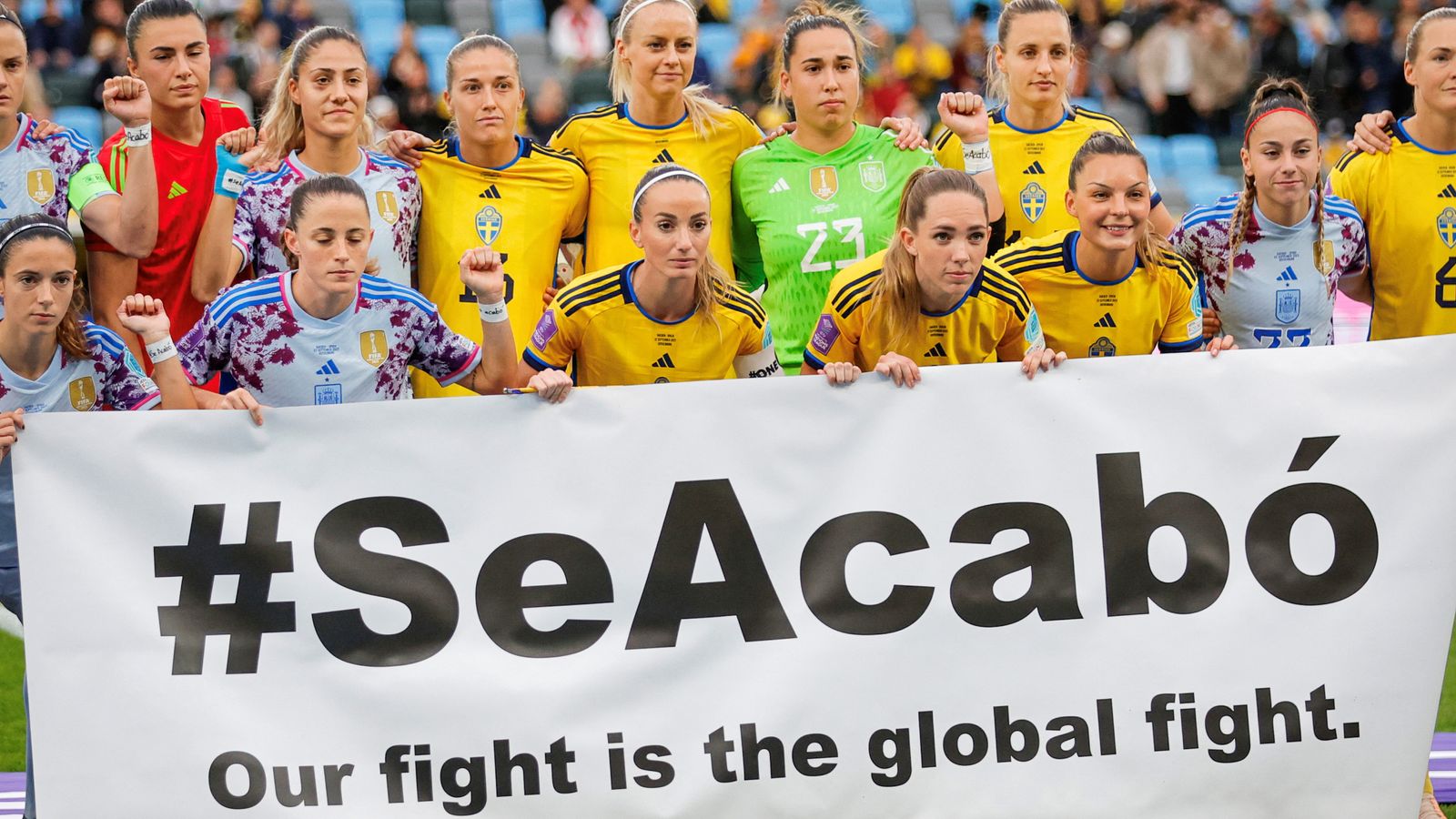 Spain and Sweden players hold a banner reading '#SeAcabo - Our fight is the global fight' before the match Bjorn Larsson Rosvall/TT News Agency via REUTERS ATTENTION EDITORS - THIS IMAGE WAS PROVIDED BY A THIRD PARTY. SWEDEN OUT. NO COMMERCIAL OR EDITORIAL SALES IN SWEDEN.