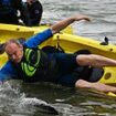 Whoopsy Davey! Ed's kayak tips over, sending Lib Dem leader tumbling into the water at Sandbanks... after refusing to say SEVEN times if his party would rejoin the EU