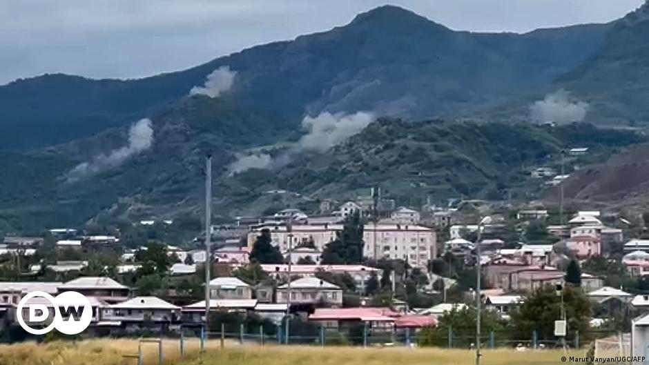 This grab taken from a UGC footage provided to AFP by Marut Vanyan on September 19, 2023 shows smoke rising from artillery strikes on a hilltop outside Stepanakert, the capital of the Armenian-populated separatist region within Azerbaijani borders.