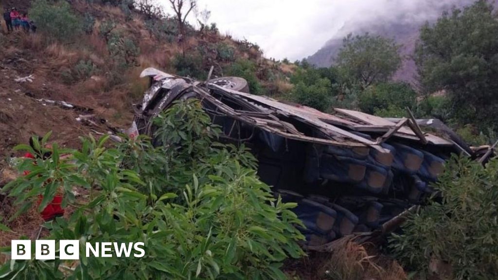 A handout photo made available by Agencia Andina shows the wreckage of a bus that fell into a ravine in Huaccoto, Churcampa province, Peru, 18 September 2023.