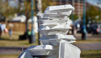 White styrofoam used food containers stacked in trash can in park. Pic: iStock