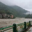 Heavy rainfall triggers sudden flooding in northeastern India, resulting in fatalities and submerging towns