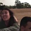 Shocking moment Israeli student, 25, is kidnapped from desert rave by Hamas militants and separated from her still-missing boyfriend - as her family share footage of her being held in Gaza amid invasion that left the Middle East on the brink of all-out war
