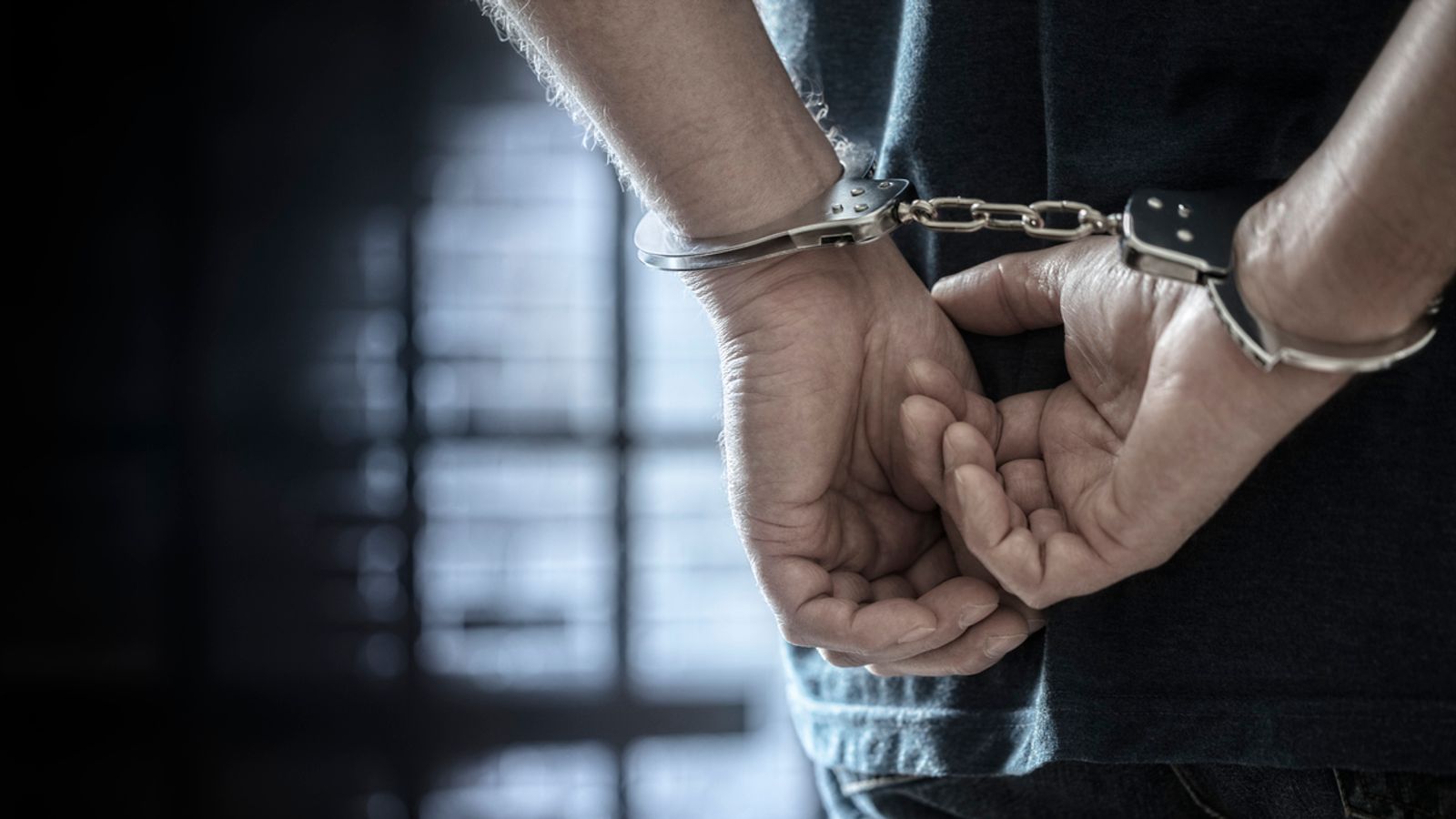 Arrested man in handcuffs
