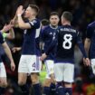 Scotland's Scott McTominay, third from left, celebrates  after scoring in the Euro 2024 qualifier against Spain in March