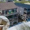 Two houses that risk being washed into the sea along the Outer Banks of North Carolina are snapped up by National Parks Service for $700,000 - and both will be torn down