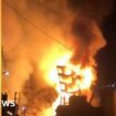 A huge fire tears through two disused buildings in the French city, with flames and smoke rising high into the sky.