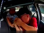 Seat belts DO save lives! Amazing moment taxi driver cheats death when robber's knife is deflected by his belt