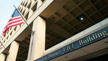 FBI agent pushed to ground, threatened with gun in D.C. carjacking