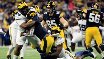 Michigan shuts out Iowa to earn its spot in an uncertain playoff field