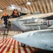Crews work on an Israeli Air Force F-15 Eagle in a hangar, said to be following an interception mission of an Iranian drone and missile attack on Israel. Pic: Israel Defense Forces/Reuters