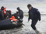 Sacré blown: French police use knives to sink asylum seekers' boat in Dunkirk - before an army of migrants then go on to overpower tear gas cops and ride on ANOTHER dinghy to the UK