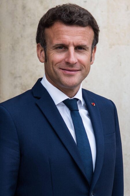 Macron Laughs Off Viral Clip of Wife’s Playful ‘Shove