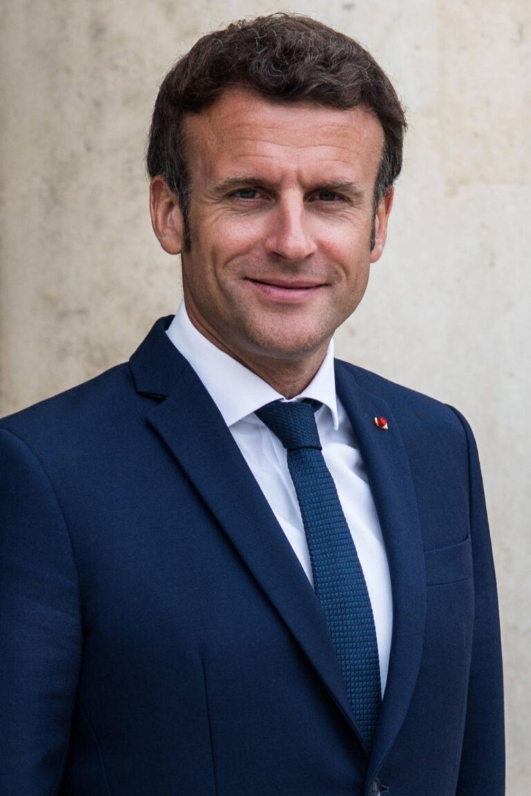 Macron Laughs Off Viral Clip of Wife’s Playful ‘Shove