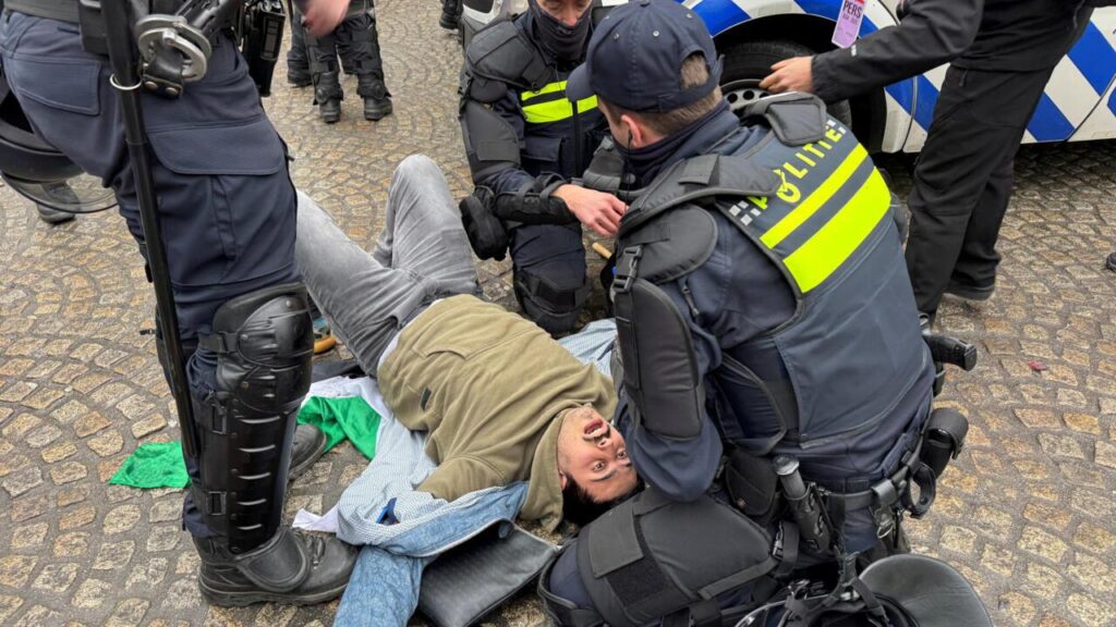 Protester Wearing ‘Israel Out of the Tour’ T-Shirt Storms Final Stretch of the Race
