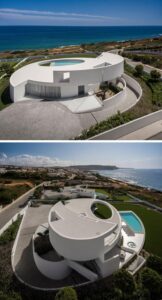 Stunning Sinuous House Blends Seamlessly with Spain’s Mountainous Landscape