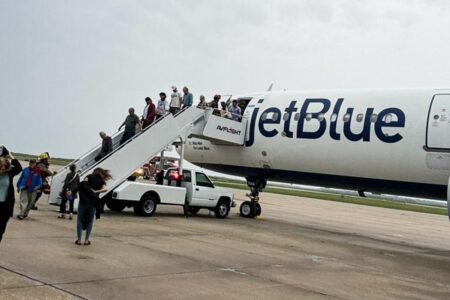 Watch a Dramatic Emergency Landing as Flames Burst from Plane Engine!