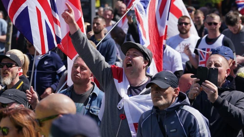 Fiery Clashes Erupt as U.K. Migrant Protests Spark Urgent Government Action Fiery Clashes Erupt as U.K. Migrant Protests Spark Urgent Government Action