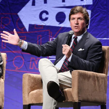 Tucker Carlson Commands the Spotlight at Turning Point USA Event in Indiana